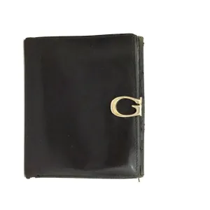 Gucci, black glossy leather, bi-fold style, rectangular, wallet with multiple pockets, tons of card slots, and a gold, hinged G clasp
