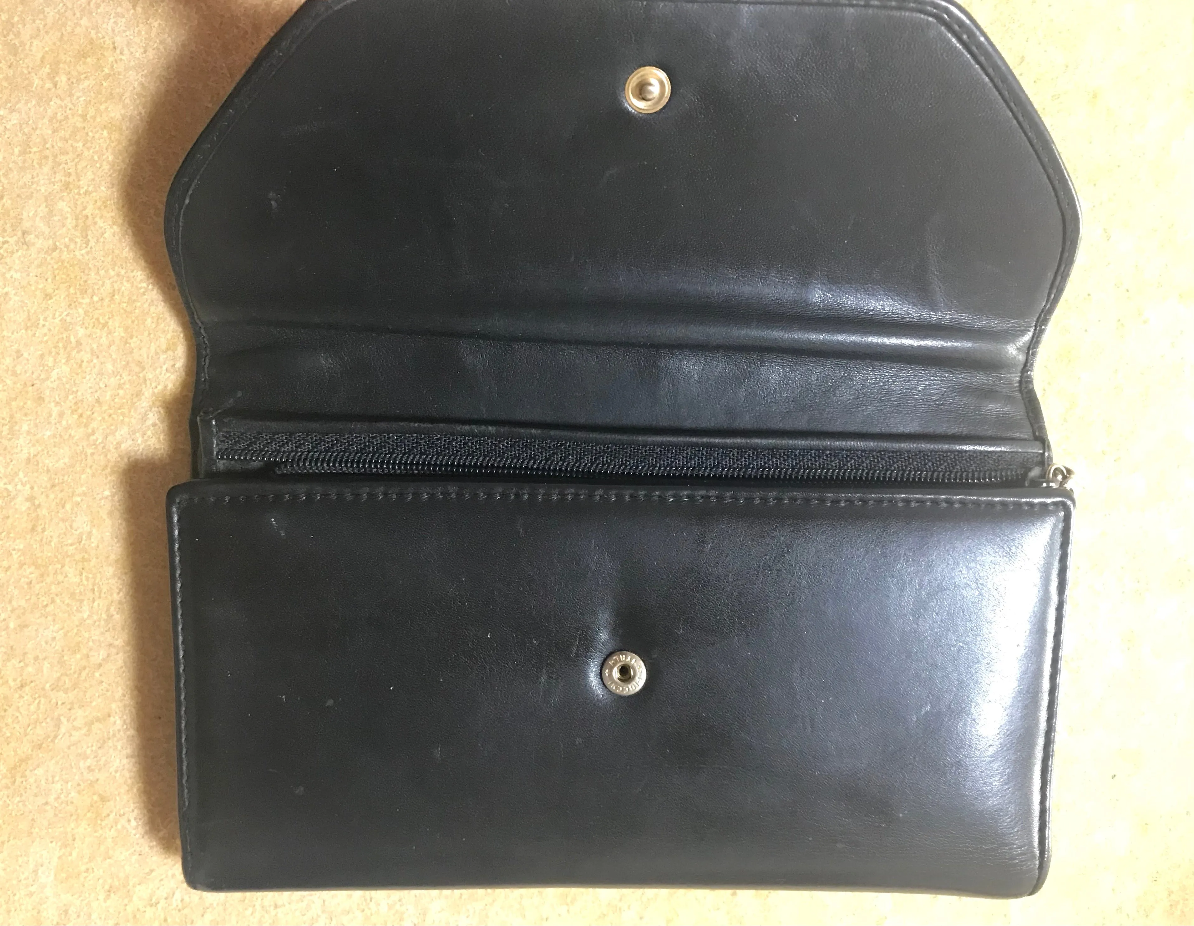 Vintage CHANEL black leather wallet with large CC stitch mark. Rare wallet from Chanel in 90’s.