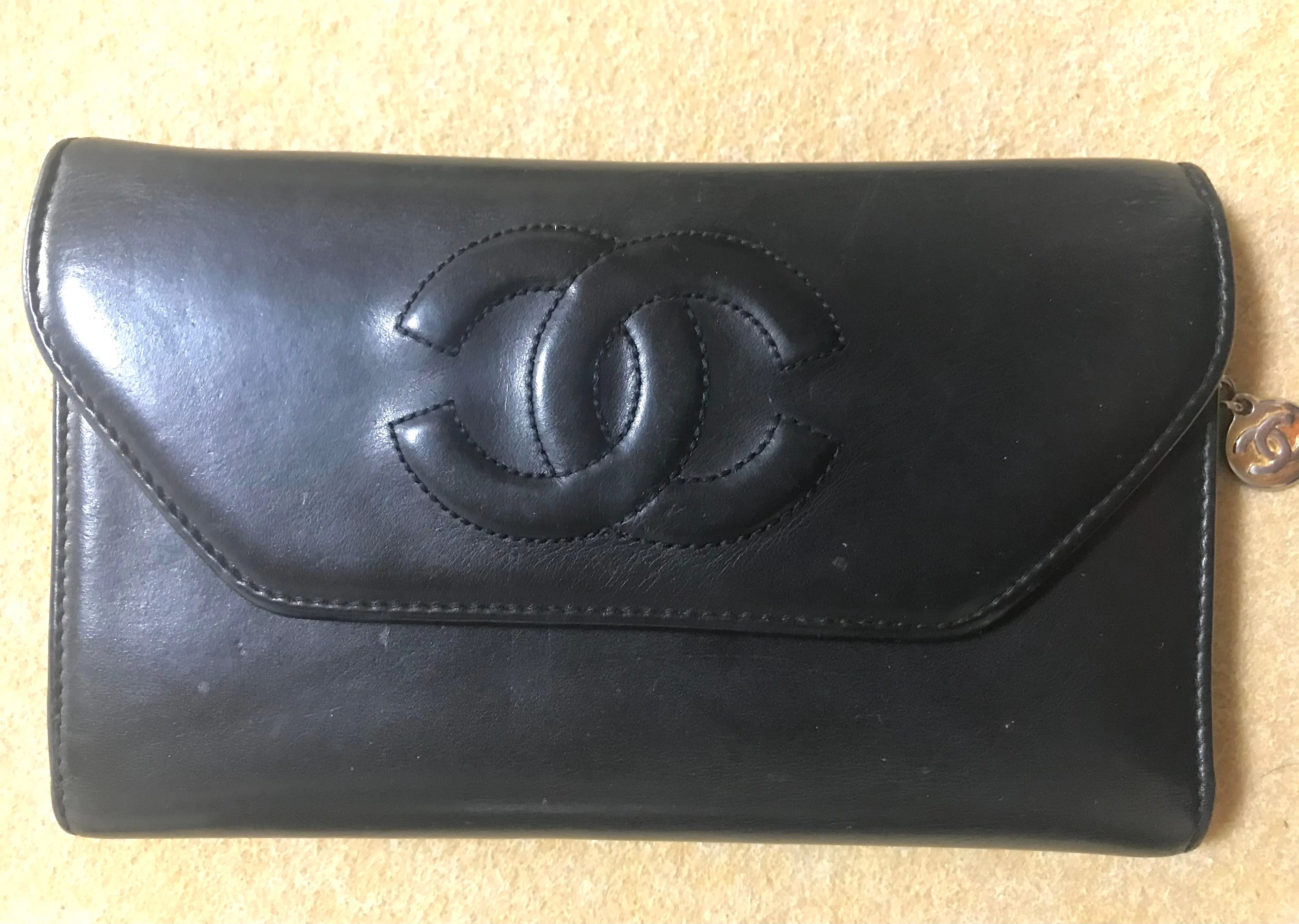 Vintage CHANEL black leather wallet with large CC stitch mark. Rare wallet from Chanel in 90’s.