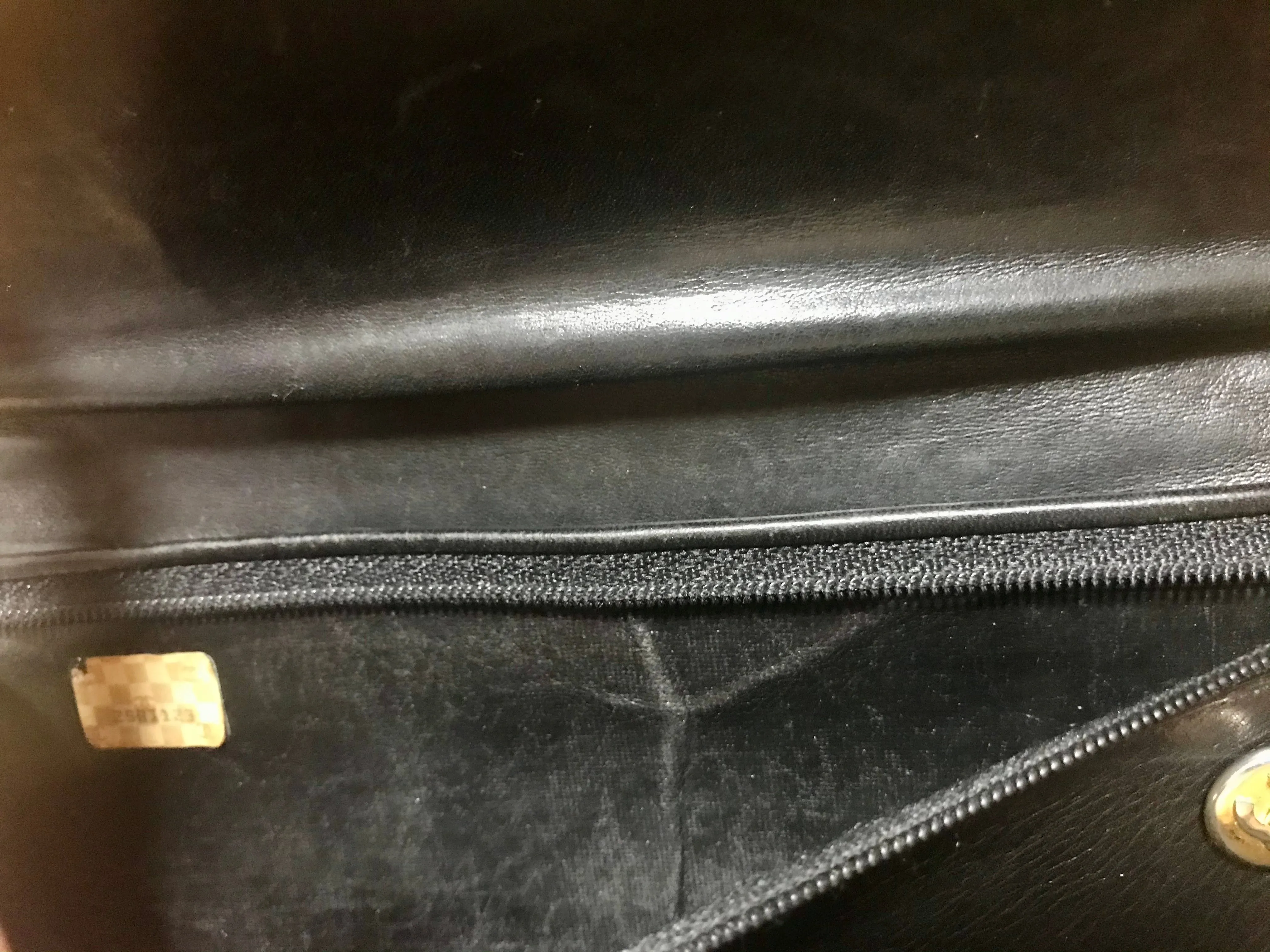 Vintage CHANEL black leather wallet with large CC stitch mark. Rare wallet from Chanel in 90’s.