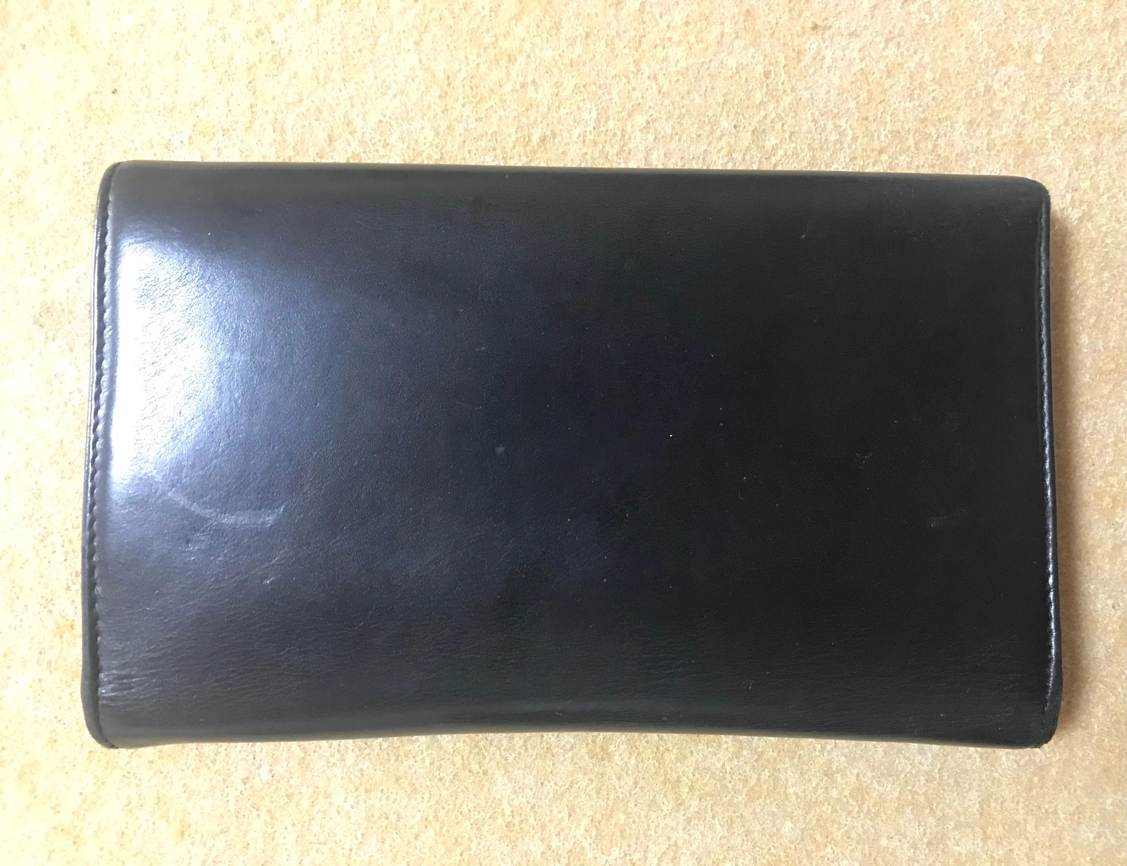 Vintage CHANEL black leather wallet with large CC stitch mark. Rare wallet from Chanel in 90’s.