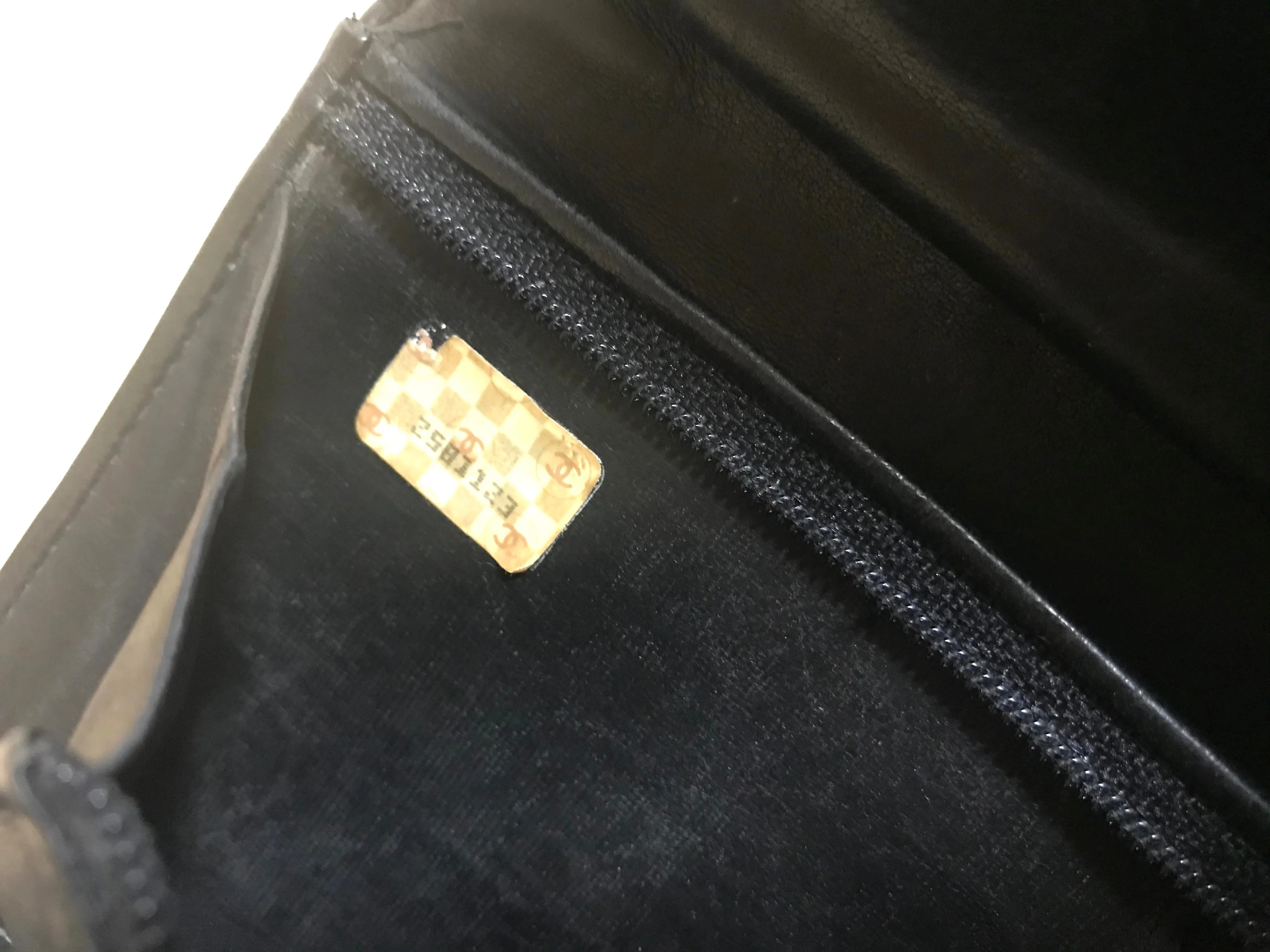 Vintage CHANEL black leather wallet with large CC stitch mark. Rare wallet from Chanel in 90’s.