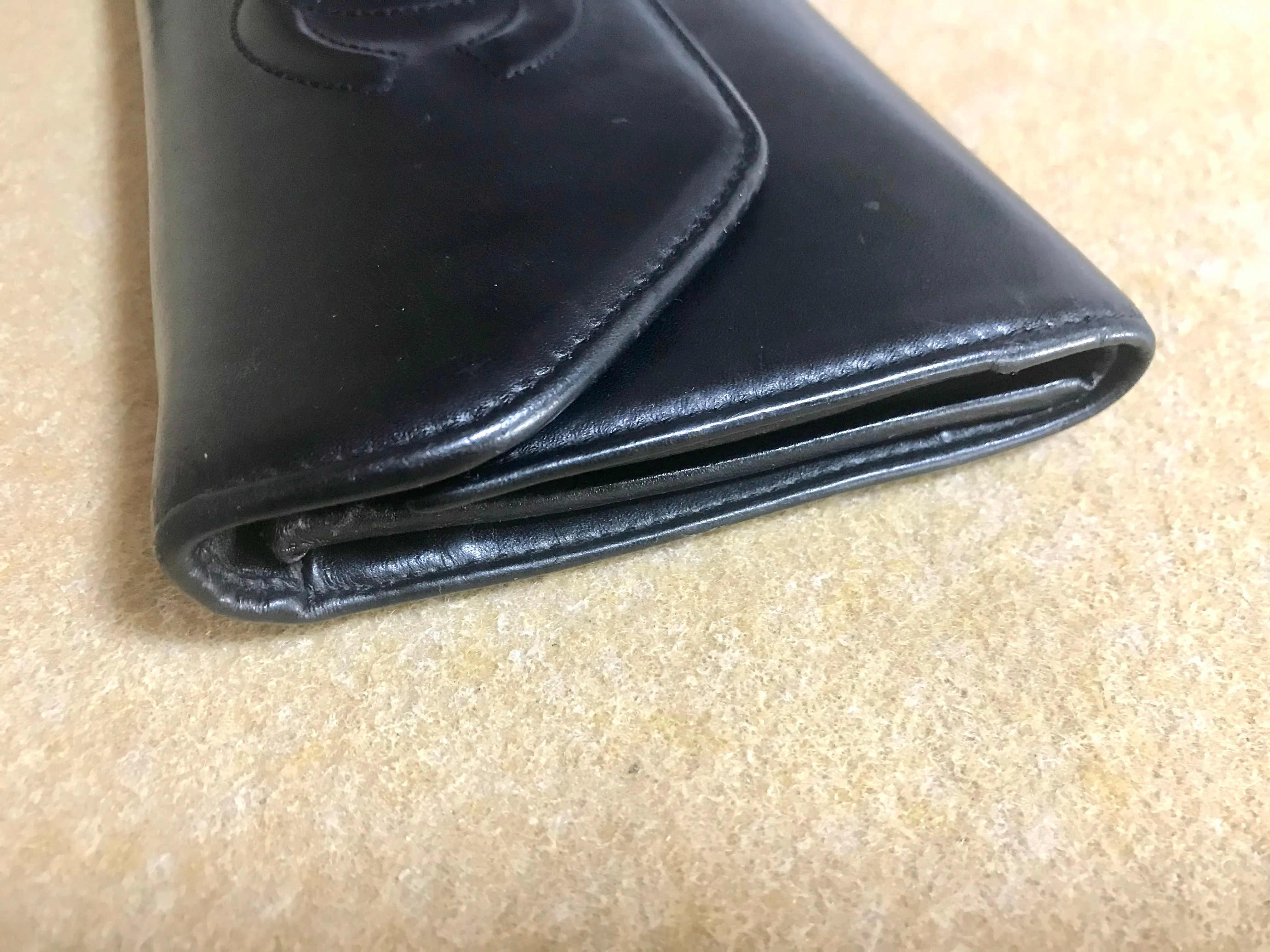 Vintage CHANEL black leather wallet with large CC stitch mark. Rare wallet from Chanel in 90’s.